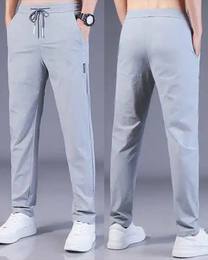 Pantalon homme, séchage rapide, flexible. Coupe moderne et confortable, idéal sport et loisirs.