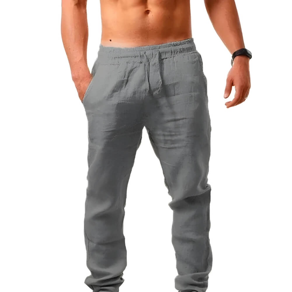 Gros plan sur le tissu léger et la coupe ample d'un pantalon jogger homme décontracté et confortable.