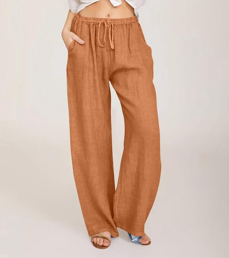 Pantalon large décontracté en lin pour femme, idéal été, style bohème chic et confortable.