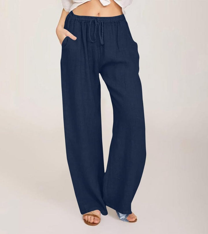 Pantalon taille haute femme, coupe large en lin, confort et style bohème décontracté pour l'été.