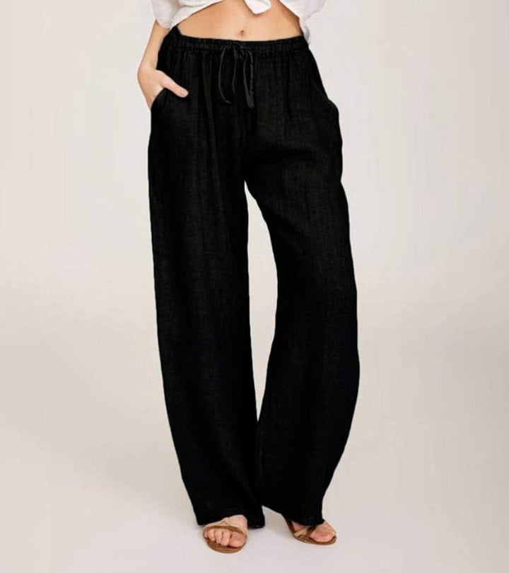 Pantalon fluide taille haute pour femme, confort optimal pour l'été et les vacances à la plage.