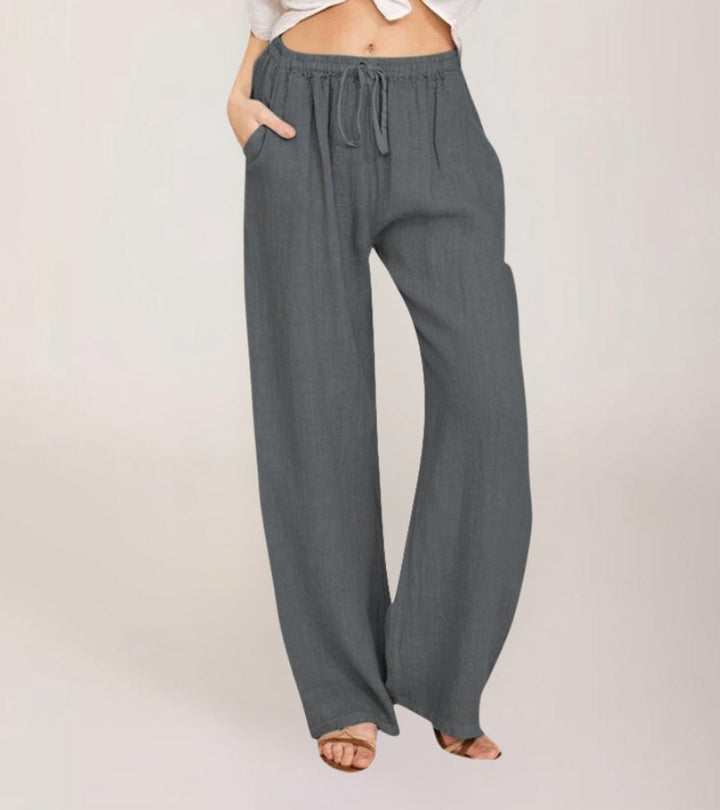 Pantalon en lin femme, coupe large et aérée, parfait pour l'été, respirant et élégant.