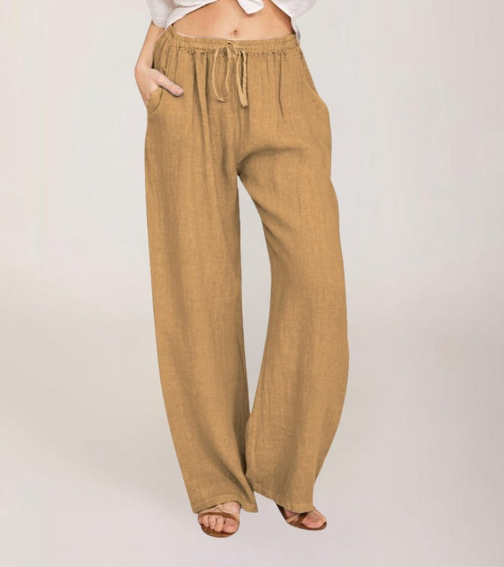 Pantalon décontracté femme, style bohème chic, idéal pour la plage ou les vacances d'été.