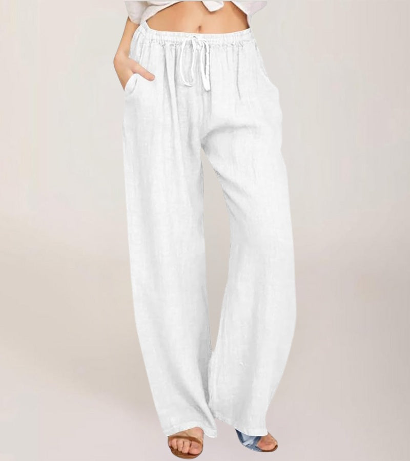 Pantalon large en lin blanc femme, taille haute, look estival décontracté et élégant, mode femme.