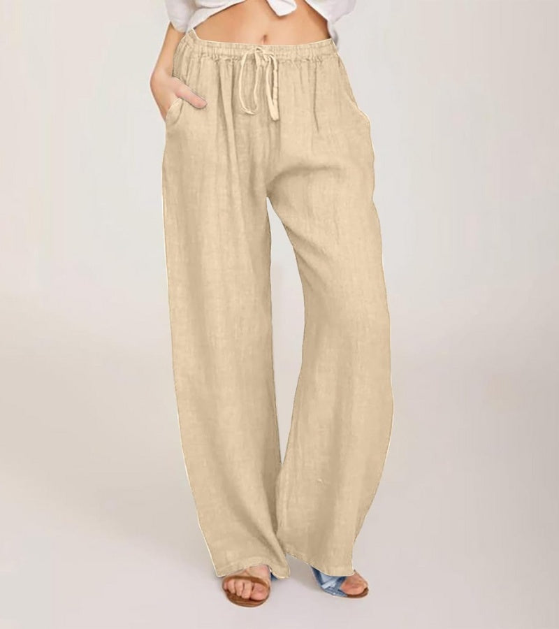 Pantalon femme fluide et élégant, coupe large pour un confort estival raffiné et léger.