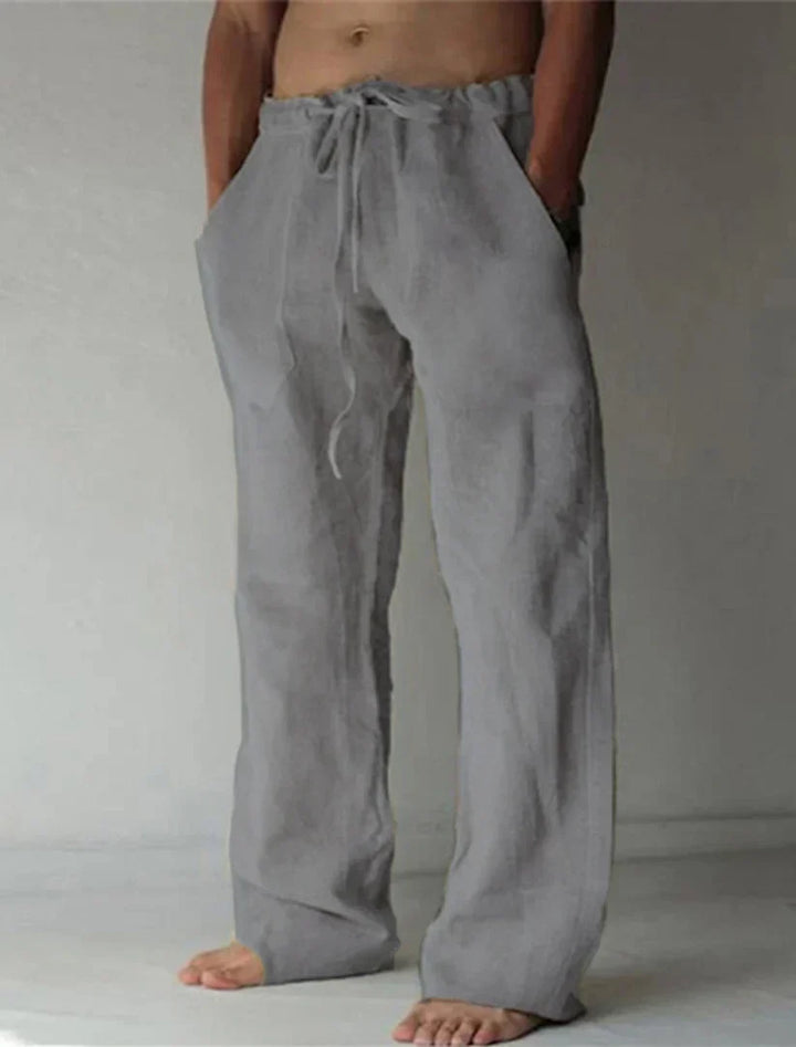 "Pantalon large en lin pour homme, coupe ample, teintes élégantes, idéal pour l'été et occasions décontractées."