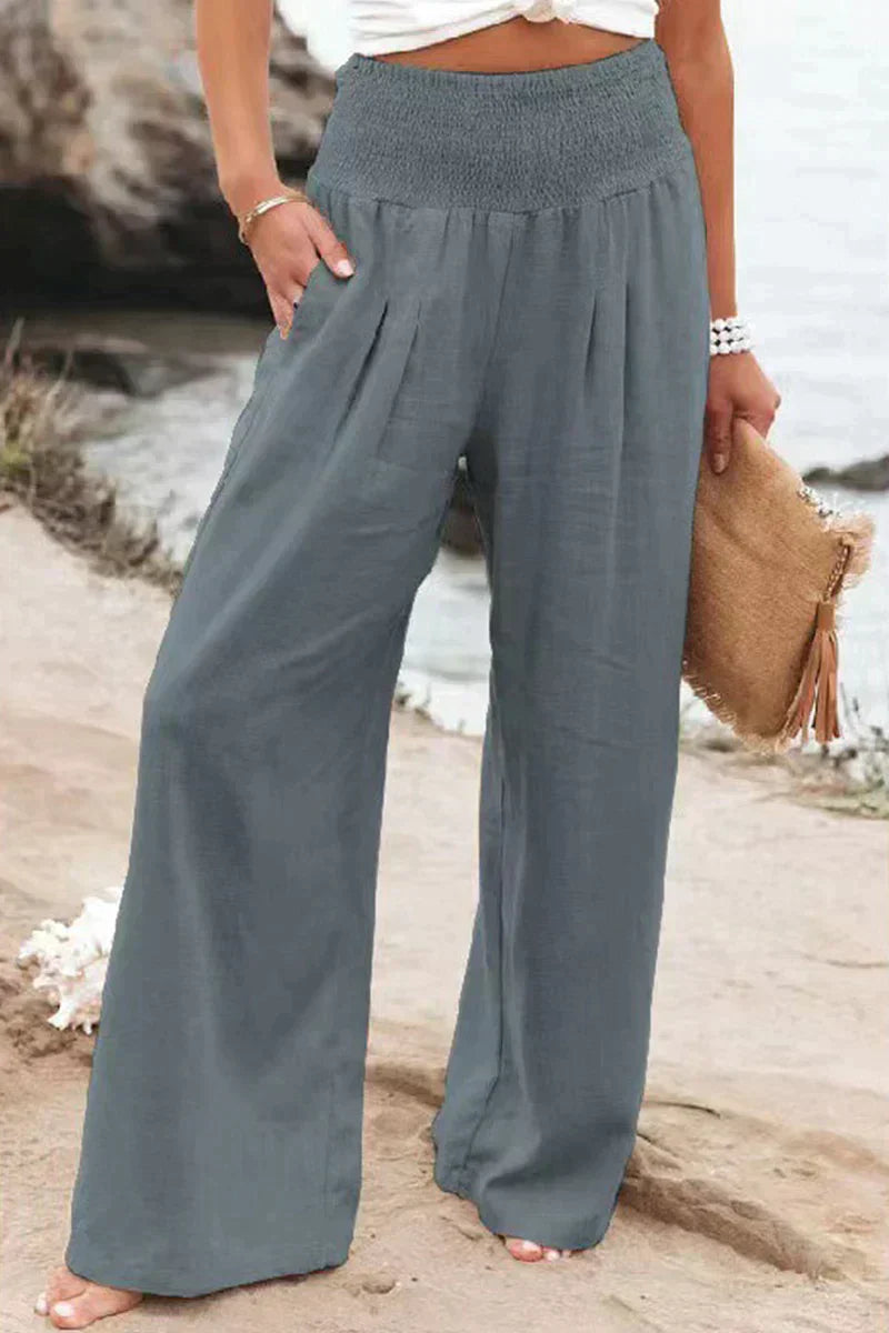 Pantalon large femme, coupe fluide et élégante, style décontracté.  Confort absolu.
