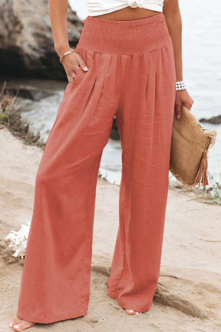 Pantalon large femme, coupe fluide et élégante, style décontracté.  Confort absolu.