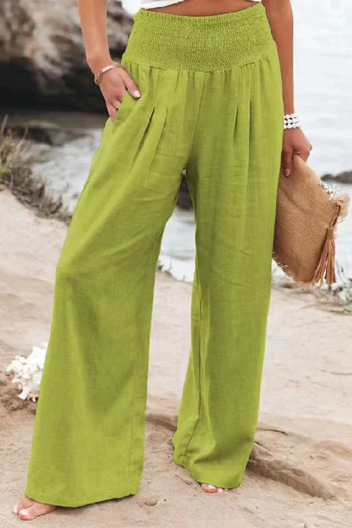 Pantalon large fluide pour femme, parfait pour un style décontracté moderne et un confort optimal toute la journée.
