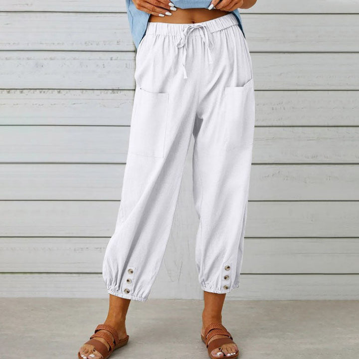 Pantalon d'été femme, coupe large et fluide. Confortable et respirant, parfait pour un look chic et décontracté.