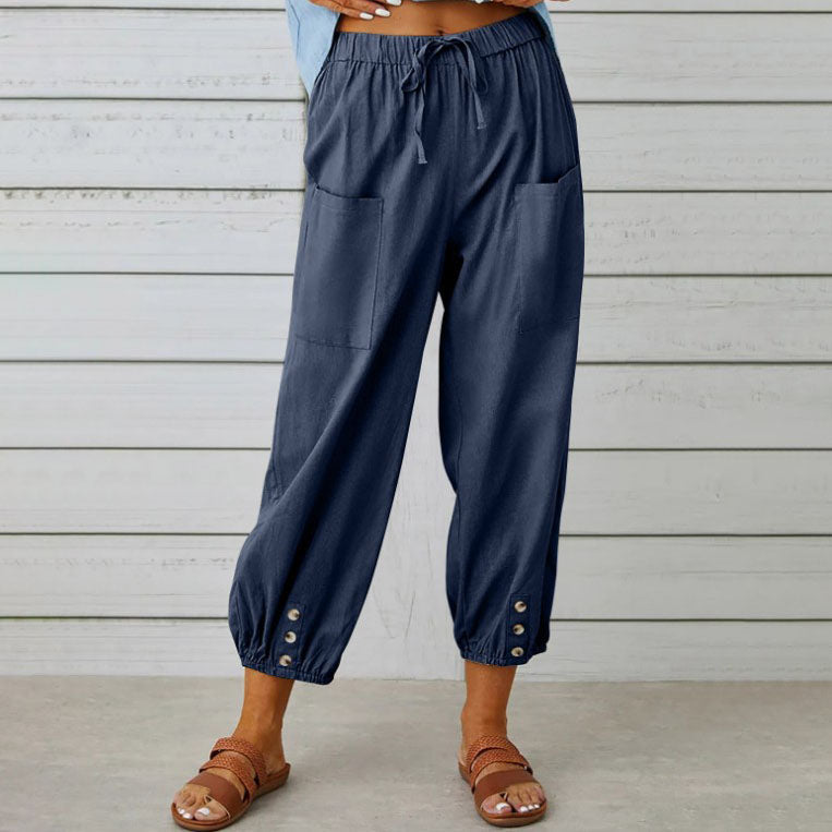 Pantalon d'été pour femme, coupe large et fluide, en tissu léger. Confort et style décontracté pour les beaux jours.