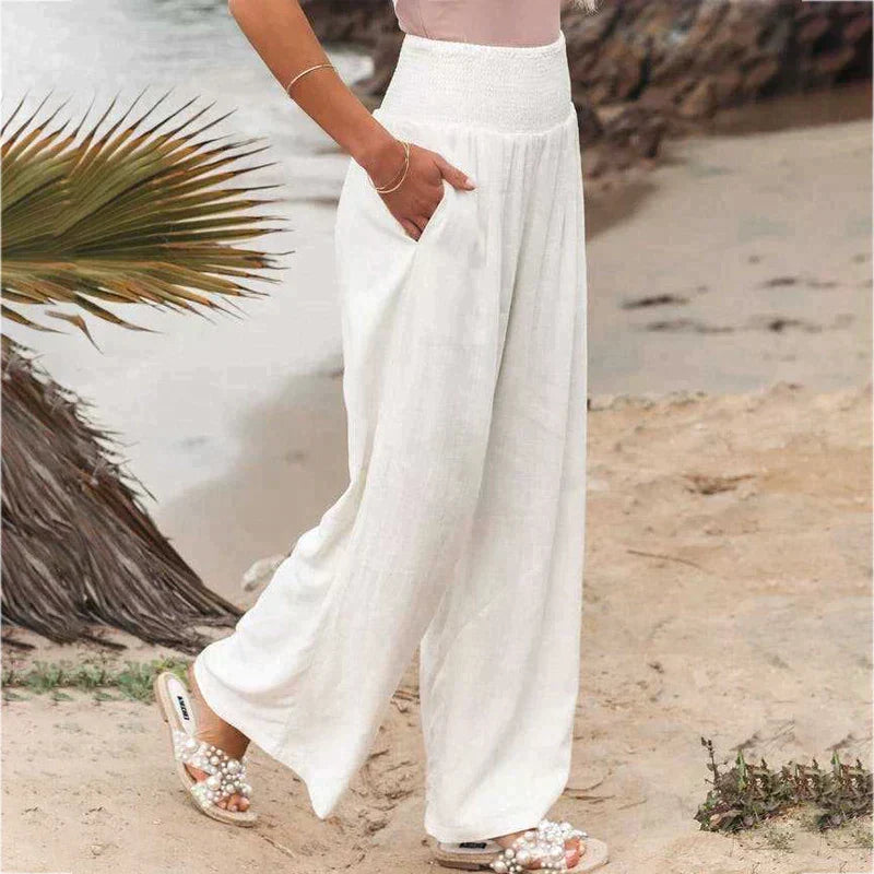 Pantalon large élégant pour femme, taille haute, couleur unie, idéal pour tenue chic et mode féminine.