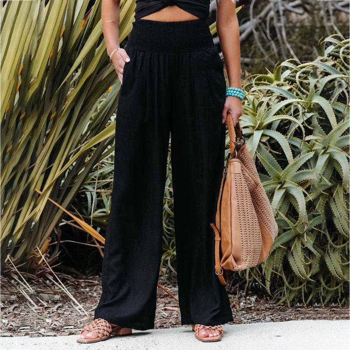 Pantalon large femme en tissu fluide, élégant et confortable, idéal pour une mode féminine chic et un style polyvalent.