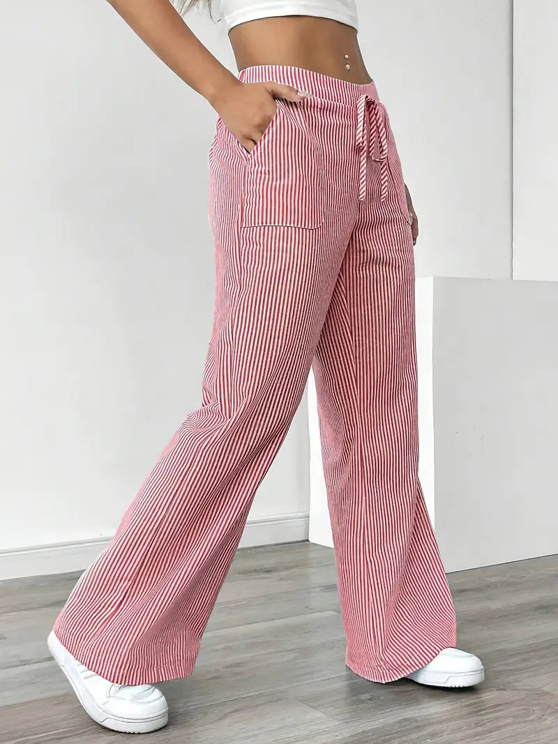 Pantalon large rayé femme, fluide et léger, essentiel pour l'été.