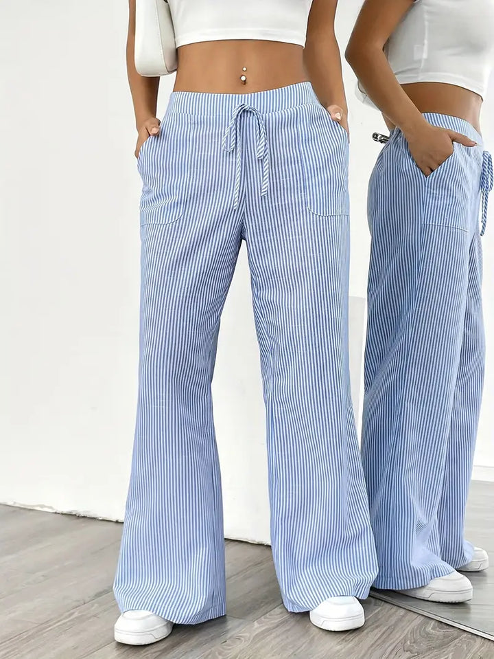 Pantalon rayé femme, large et léger, parfait pour un été stylé.