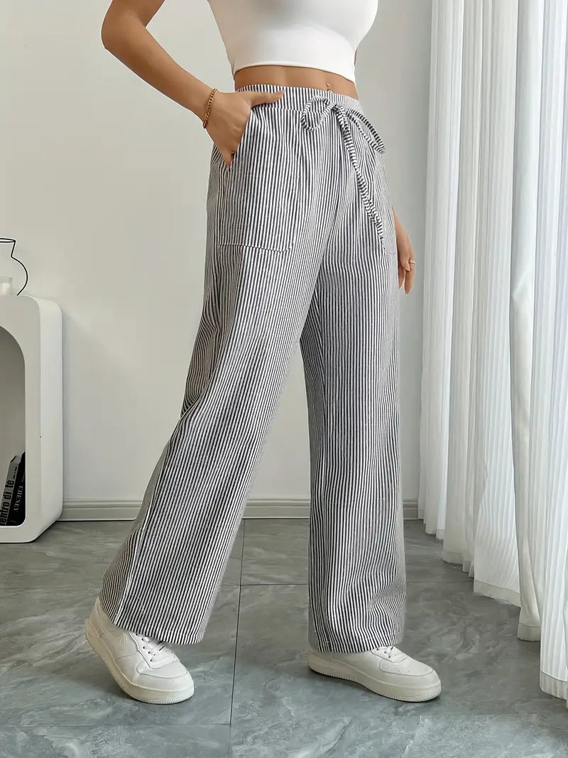 Pantalon femme décontracté, large, rayé et léger, avec poches.