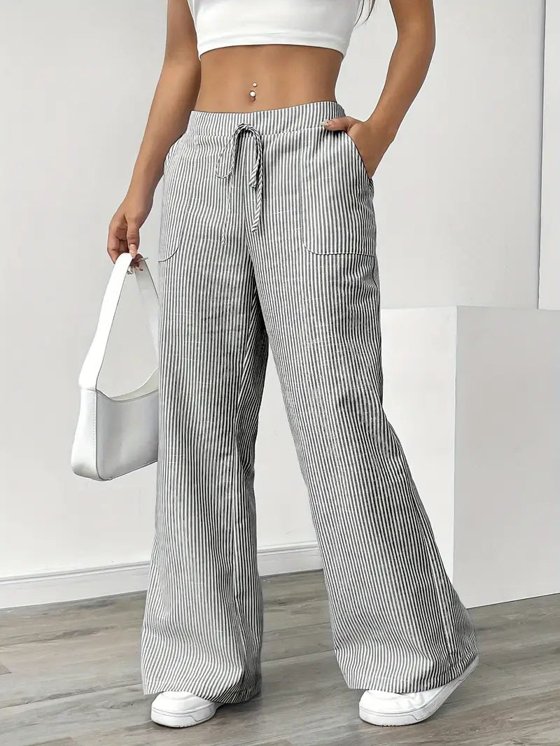 Pantalon large d'été pour femme, rayé et élégant, avec poches.