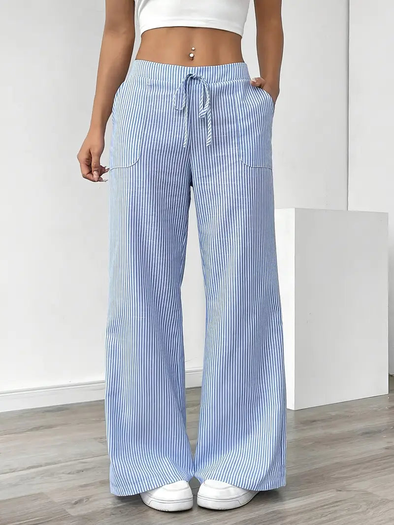 Pantalon rayé léger avec poches, parfait pour les vacances et la mode femme.