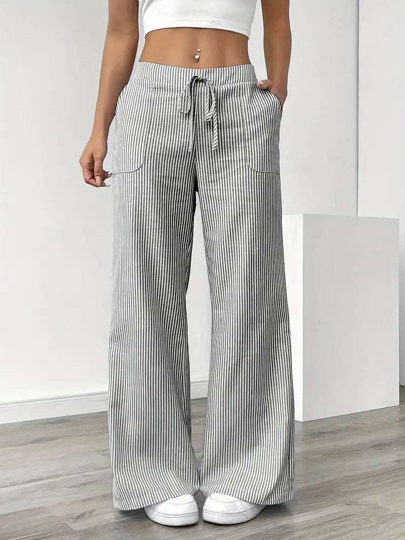 Pantalon été femme à taille haute, style large et confortable.