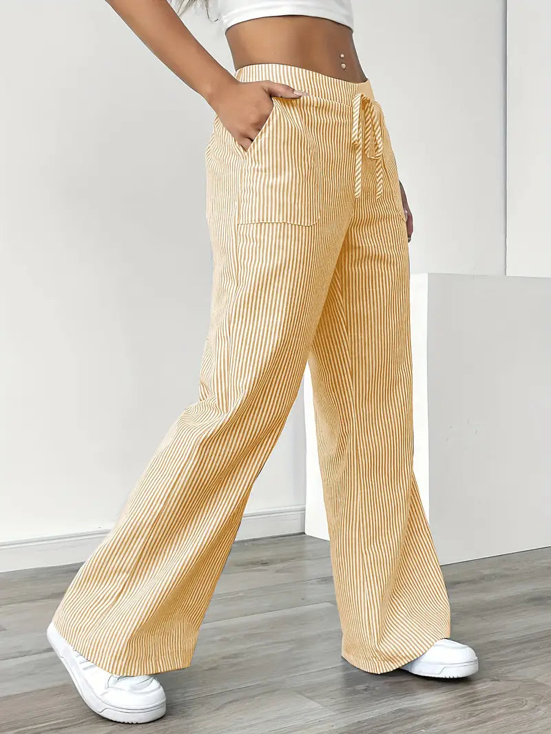 Pantalon large d'été pour femme, à rayures élégantes et taille haute.