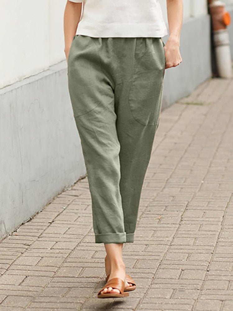 Pantalon large fluide femme, coupe évasée moderne offrant confort et élégance.