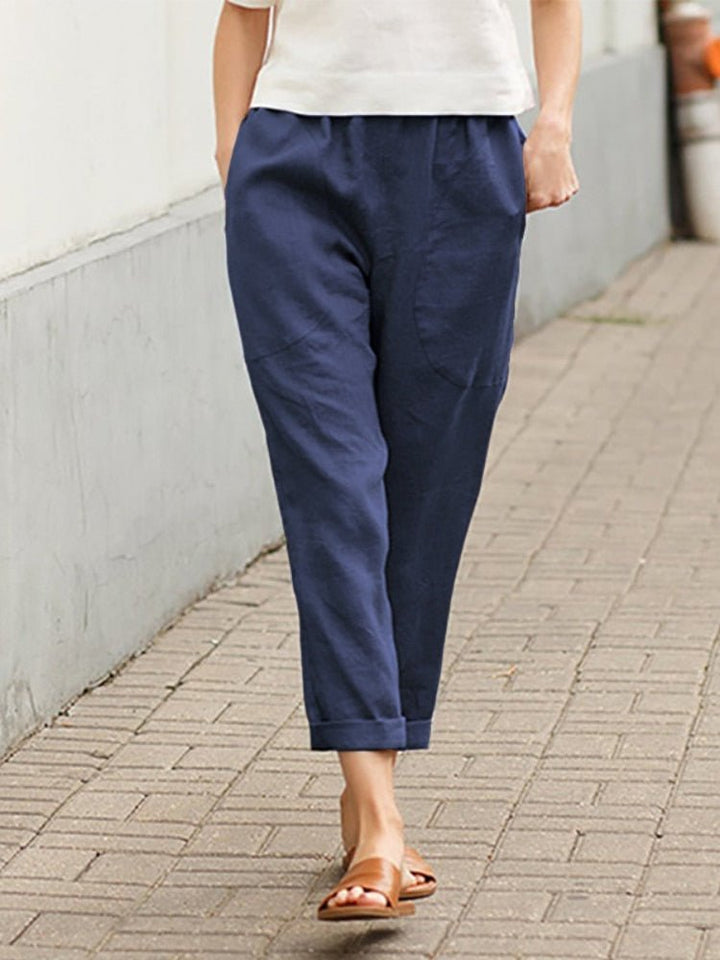 Pantalon large évasé femme polyvalent, du décontracté au chic avec une taille haute.