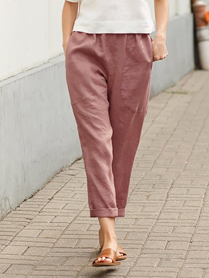 Silhouette élégante avec ce pantalon large évasé taille haute pour femme, confort assuré.