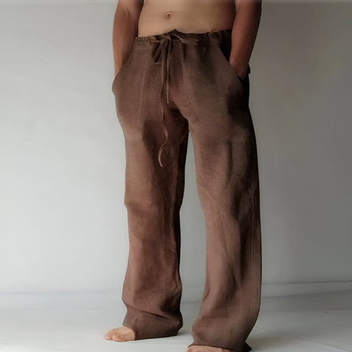 Pantalon lin homme été, coupe chic et respirante.  Parfait pour les journées chaudes.