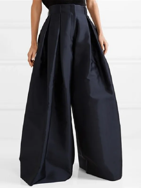 Pantalon femme plissé taille haute, coupe jambe large. Parfait pour une silhouette élégante et un confort optimal.