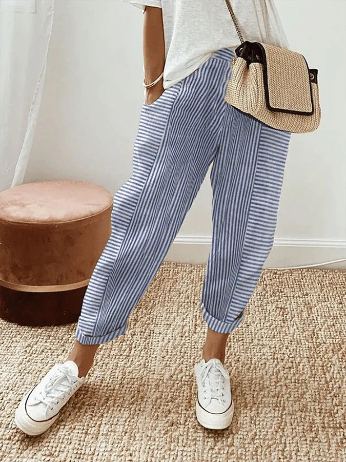 Pantalon femme taille haute à rayures en coton. Confort décontracté, idéal pour la mode estivale.