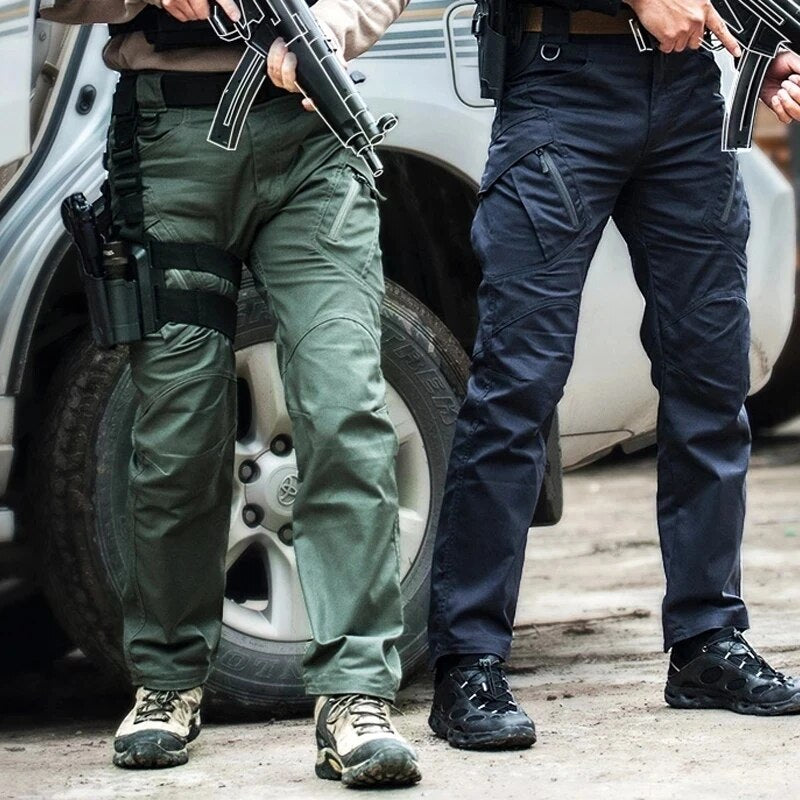 Pantalon cargo stretch homme, tactique, offre confort et liberté de mouvement pour sport et aventure.