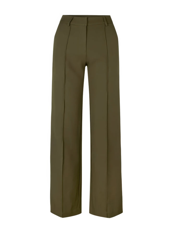 Pantalon femme en mouvement, coupe droite. Élégance et confort pour un look chic, décontracté ou de bureau.