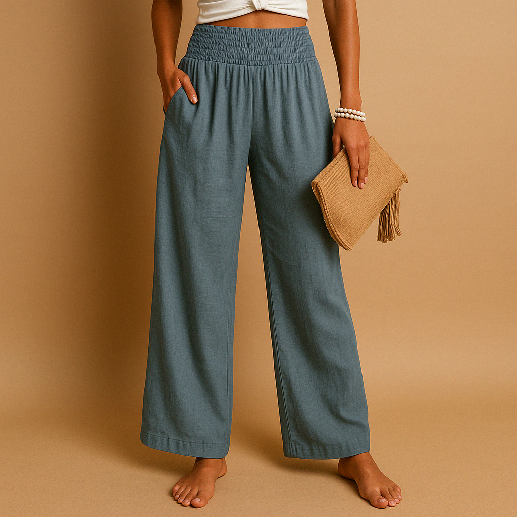 Pantalon femme en lin respirant, taille haute, couleur claire, confort estival décontracté et élégant.