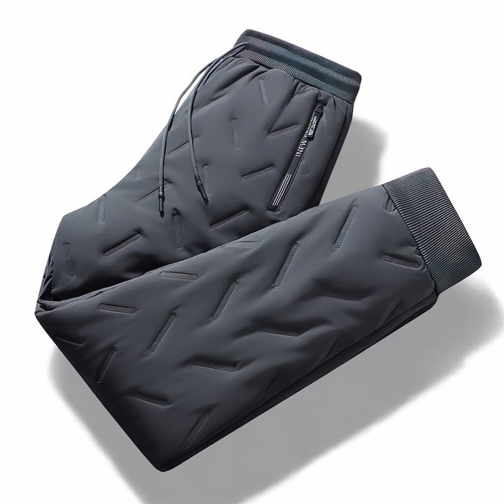 Pantalon jogging femme hiver, thermique et imperméable, avec intérieur polaire chaud pour rester au sec et confortable.