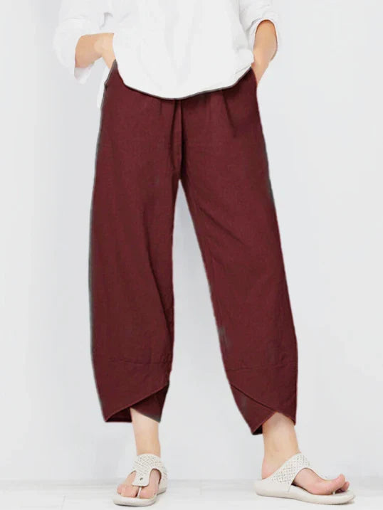 Pantalon femme trois-quarts ample avec taille élastique, coupe fluide et décontractée pour l'été.