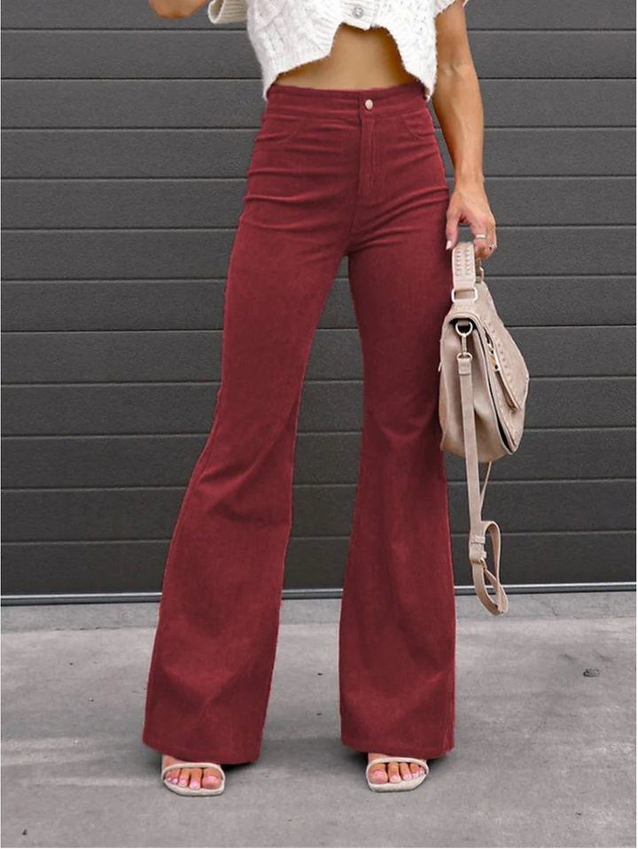 Pantalon évasé rétro femme en velours côtelé, taille haute, style années 70. Confort et élégance vintage.