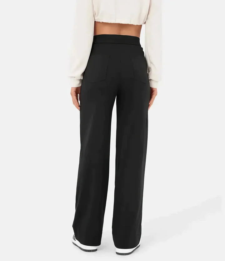 Pantalon bleu marine femme, taille haute élastique, style chic et fluide.