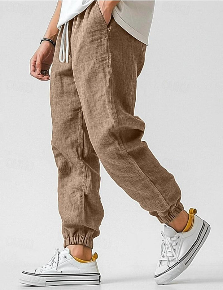 "Pantalons en lin pour hommes, couleur bleue, coupe décontractée, léger et respirant pour un style estival élégant."