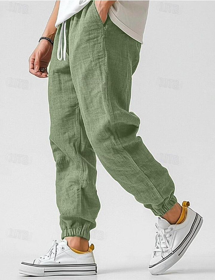 "Pantalons en lin pour hommes, couleur bleue, coupe décontractée, léger et respirant pour un style estival élégant."