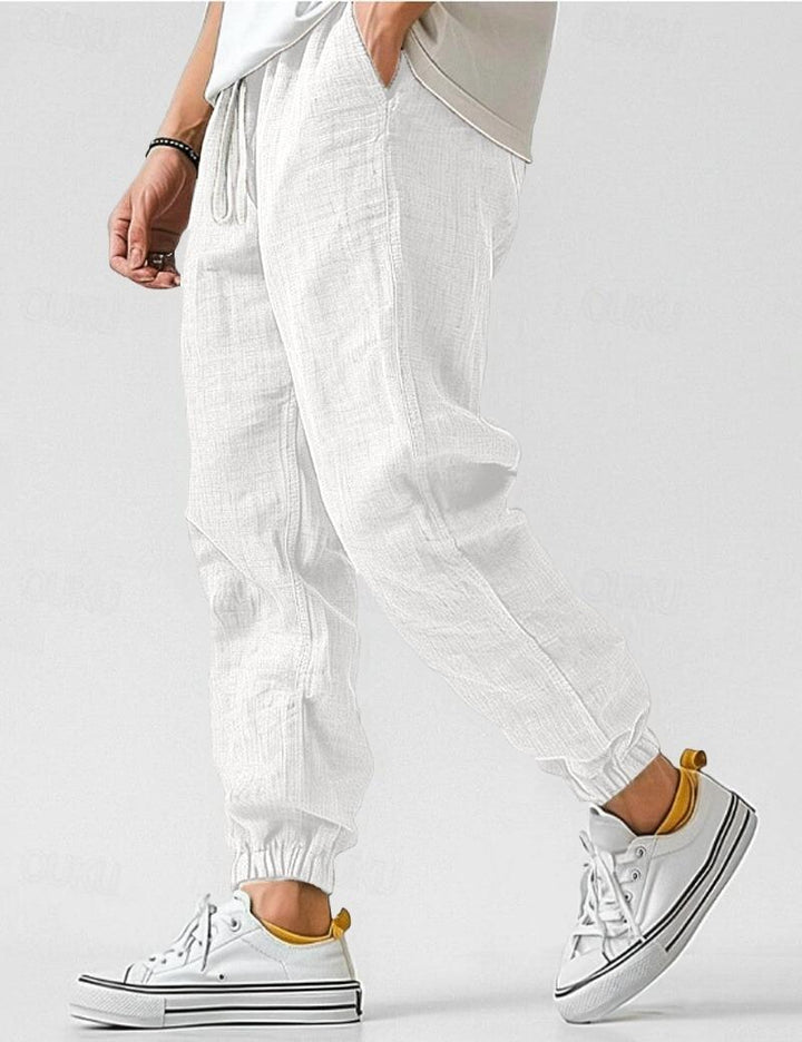 "Pantalons en lin pour hommes, couleur bleue, coupe décontractée, léger et respirant pour un style estival élégant."
