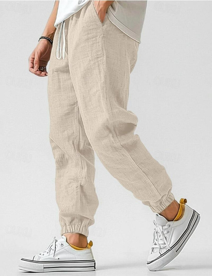 "Pantalons en lin pour hommes, couleur bleue, coupe décontractée, léger et respirant pour un style estival élégant."