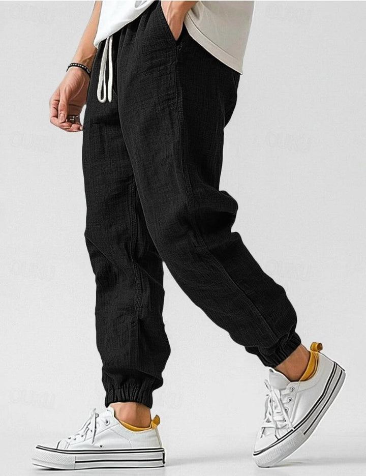 "Pantalons en lin pour hommes, couleur bleue, coupe décontractée, léger et respirant pour un style estival élégant."