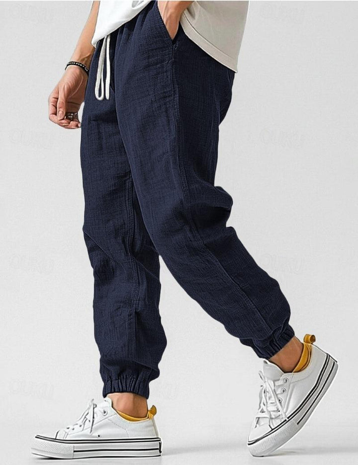 "Pantalons en lin pour hommes, couleur bleue, coupe décontractée, léger et respirant pour un style estival élégant."