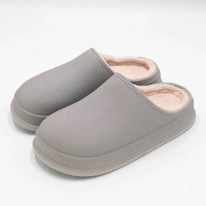 Pantoufles d'hiver ergonomiques soulageant la douleur aux pieds, avec semelle antidérapante pour un confort quotidien.