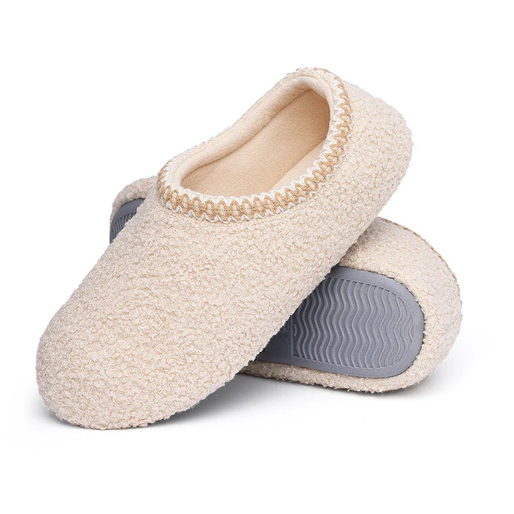 Pantoufles d'intérieur chaudes, bouclées, en fausse fourrure, pour le confort hivernal féminin.