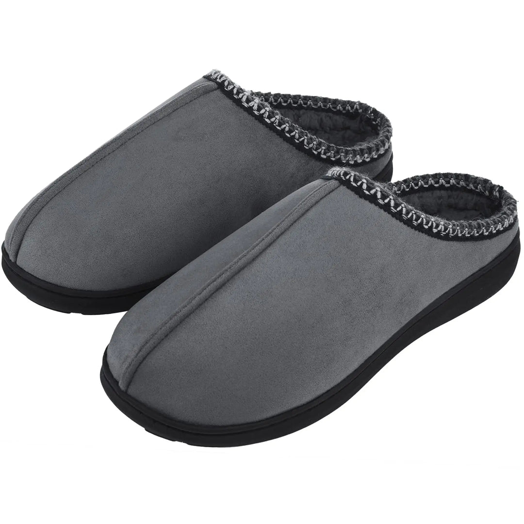 Pantoufles en fourrure confortables et chaudes pour le domicile, conçues pour les pieds des femmes et des hommes.