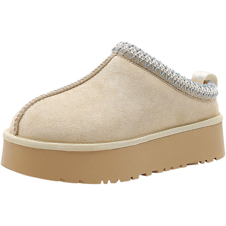 Paire de pantoufles femme luxueuses en peau de mouton véritable et fourrure, chaudes et douces pour un confort hivernal.