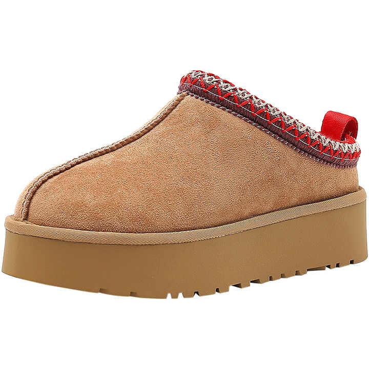 Talon confortable et support des pantoufles femme en peau de mouton doublées fourrure, parfaites pour l'intérieur.