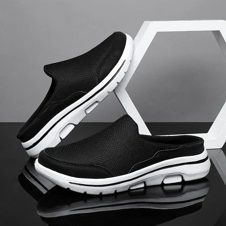 Pantoufles homme, confort luxueux. Design élégant, coton respirant. Chaussons doux pour la maison.