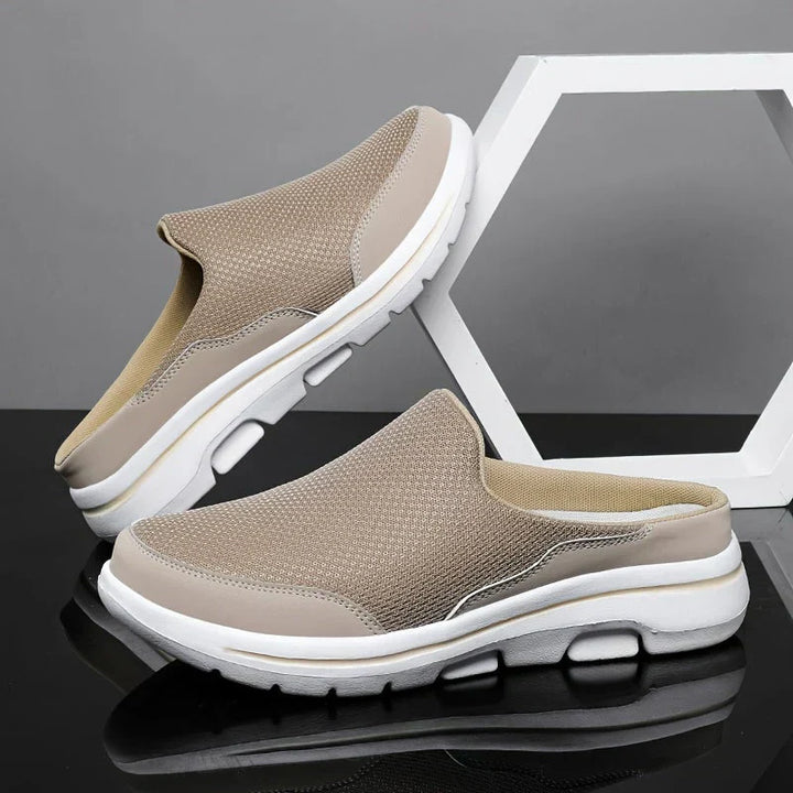 Pantoufles homme, confort luxueux. Design élégant, coton respirant. Chaussons doux pour la maison.